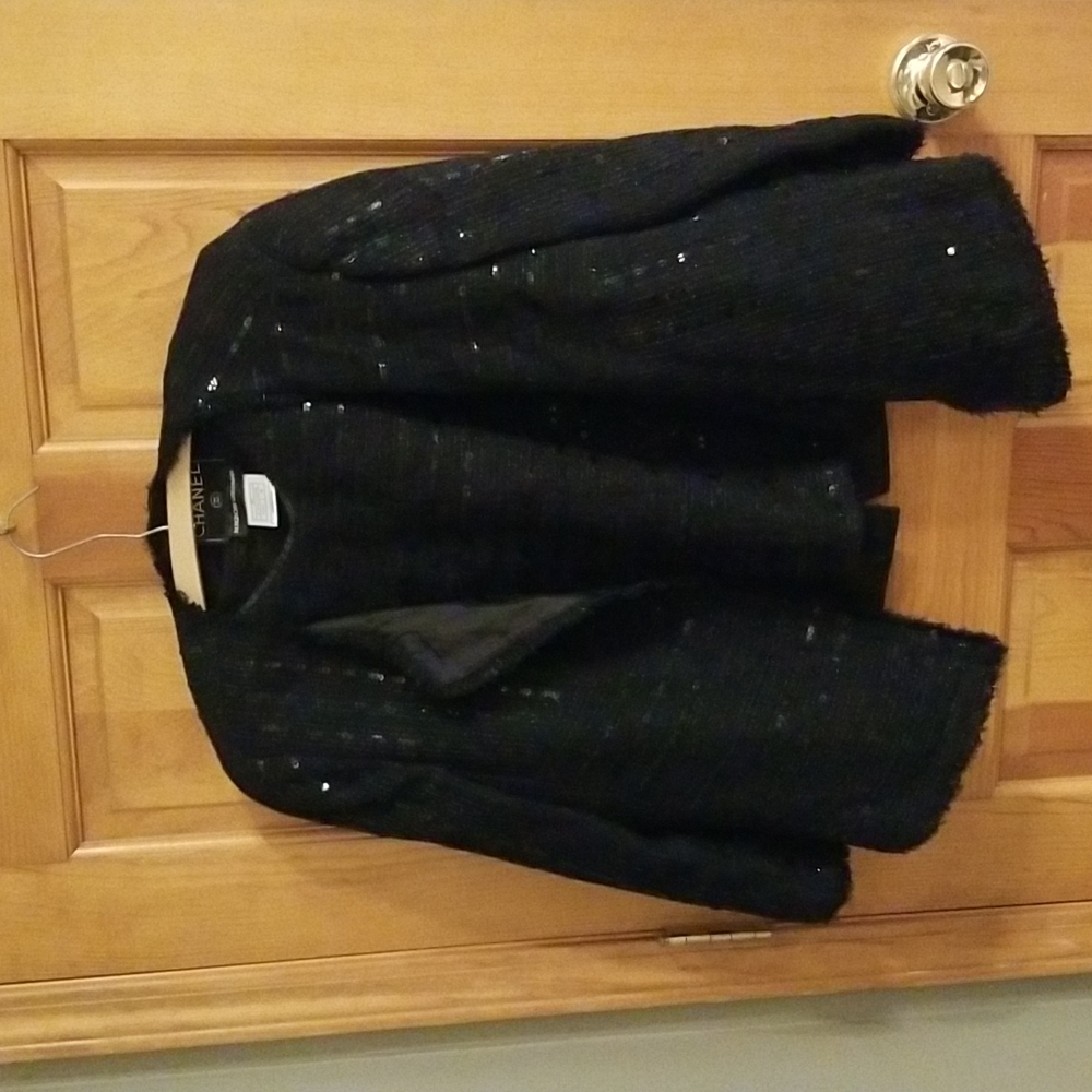 Black cocktail jacket with top.